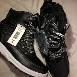 Weatherproof black and white boots